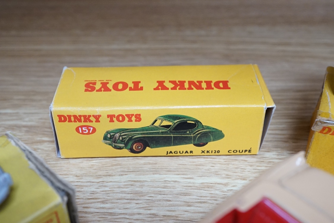 Six boxed Dinky Toys cars; Cunningham C-5R (133), Jaguar 3.4 saloon (195) in grey, Packard convertible (132) in fawn, Jaguar XK120 (157) in dark red (in a reproduction box), Humber Hawk (165) in two-tone green and black,